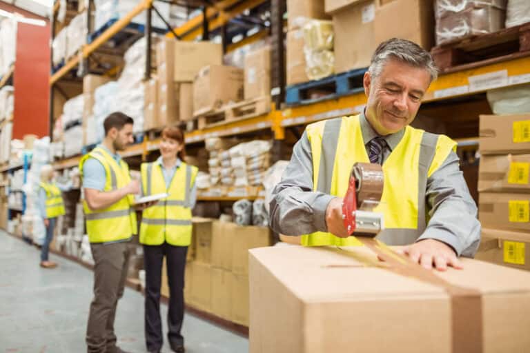 employees working in packaging facility